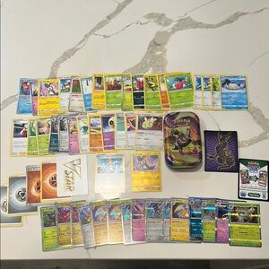 Pokemon Trading Card Collection with Tin